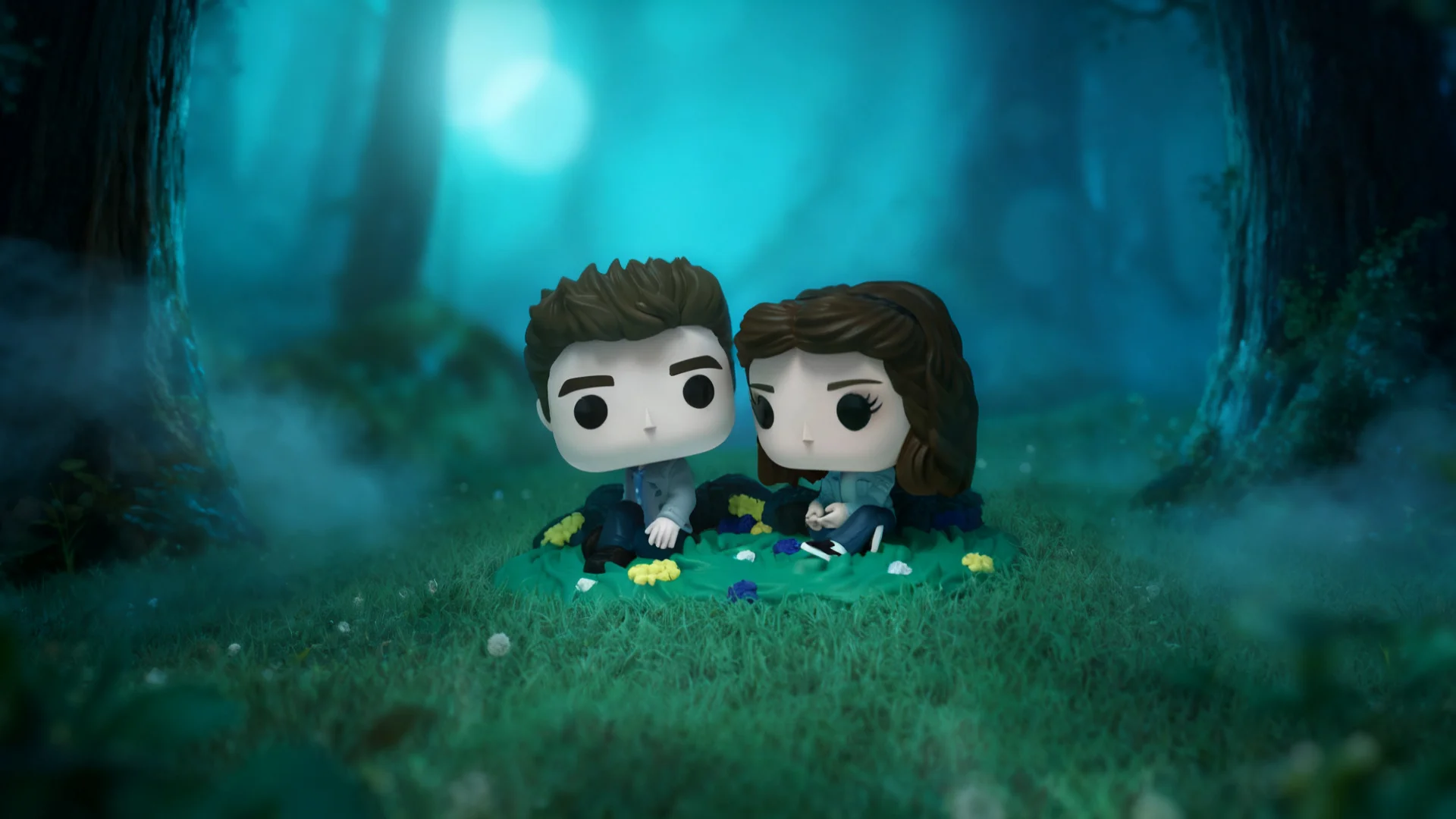 Funko Pop Twilight Saga - figurki Edwarda Cullena i Belli Swan siedzące na kwiatowej polanie w lesie Forks
